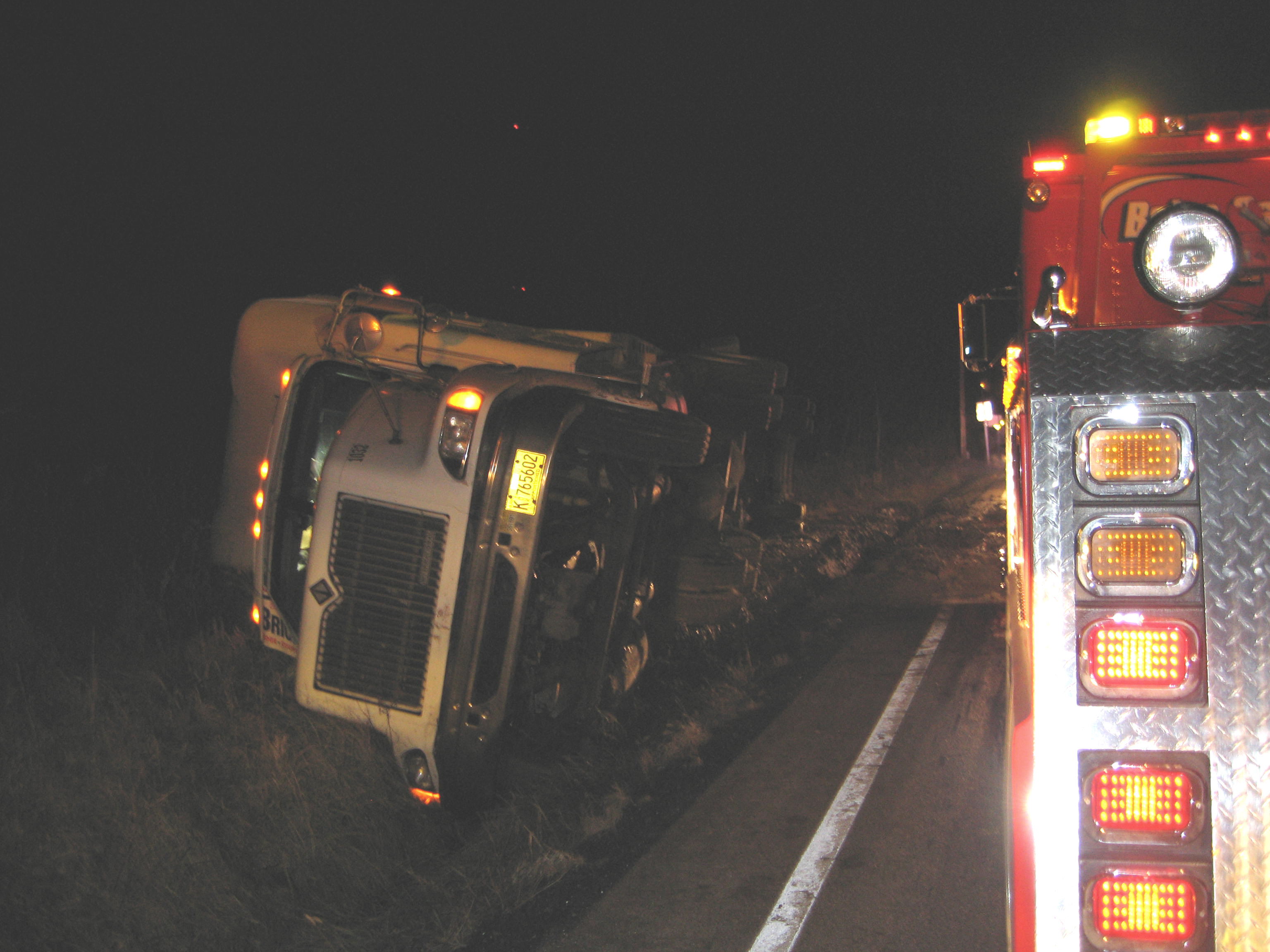 Overturned loaded with plastic materials